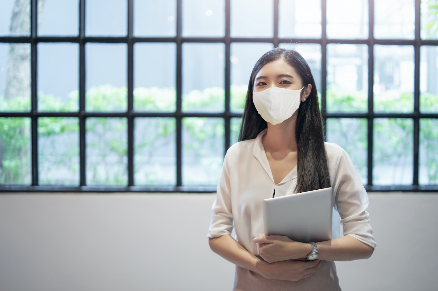 Asian businesswoman office assistance employee wearing face mask